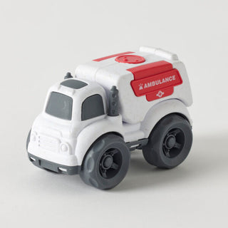 Toy ambulance on a light gray background
