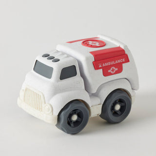 Toy ambulance on a light gray background