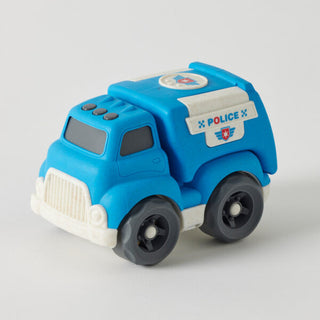 Toy police truck with blue body and black wheels on a light gray background