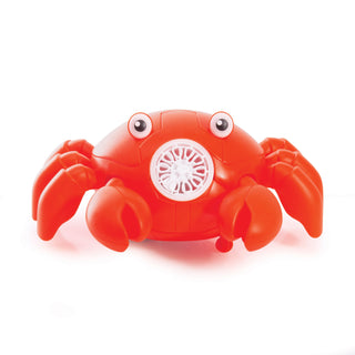 Red toy crab on a white background
