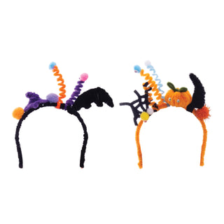 Two Halloween-themed headbands with decorative elements on a white background