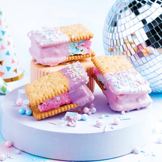 Pastel-colored ice cream sandwiches with a disco ball in the background